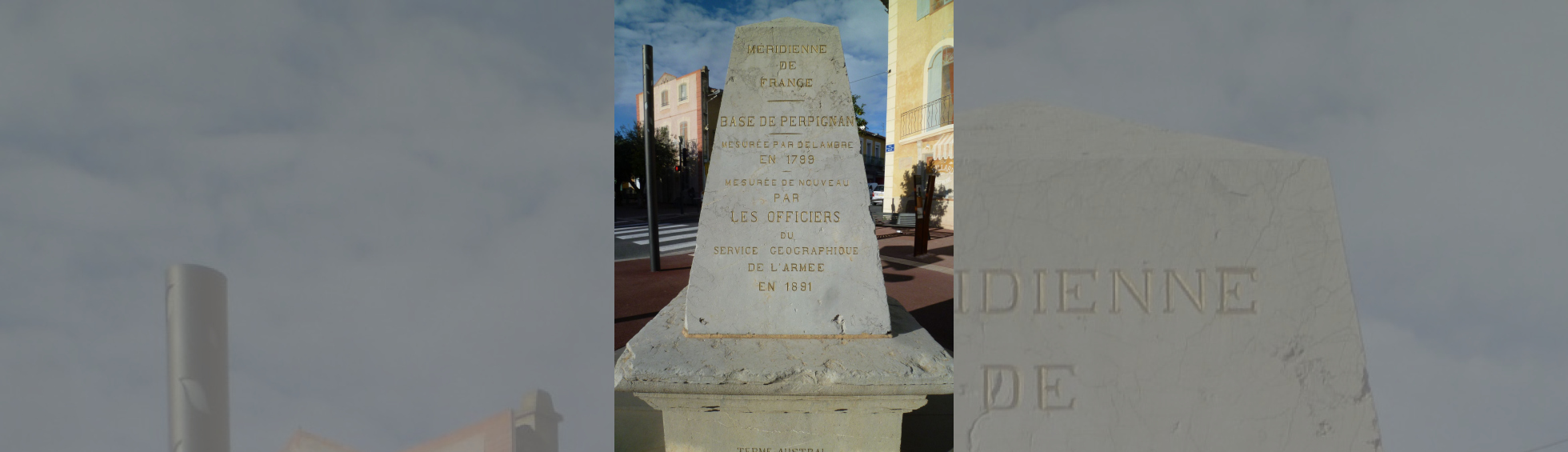 Bloc de pierre calcaire taillée gris en pyramide ; inscrits:méridienne de France base de Perpignan 