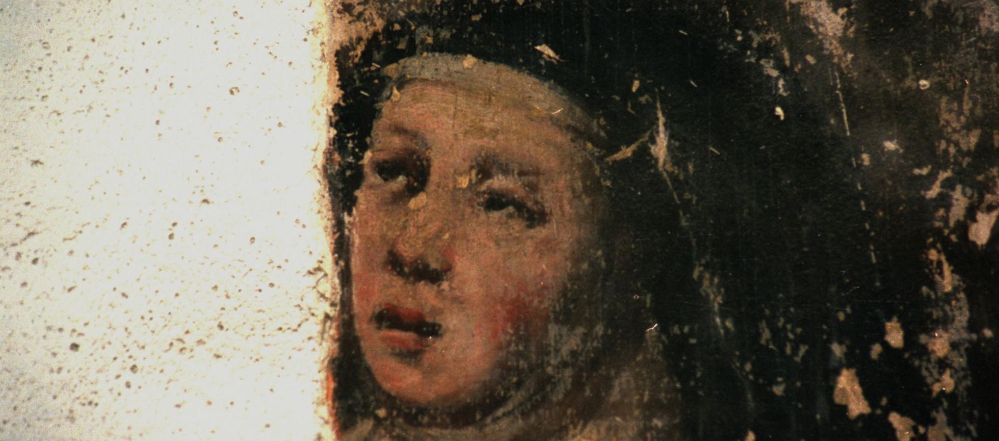 Détail de peinture murale du 17ième: une soeur clarisse en prière